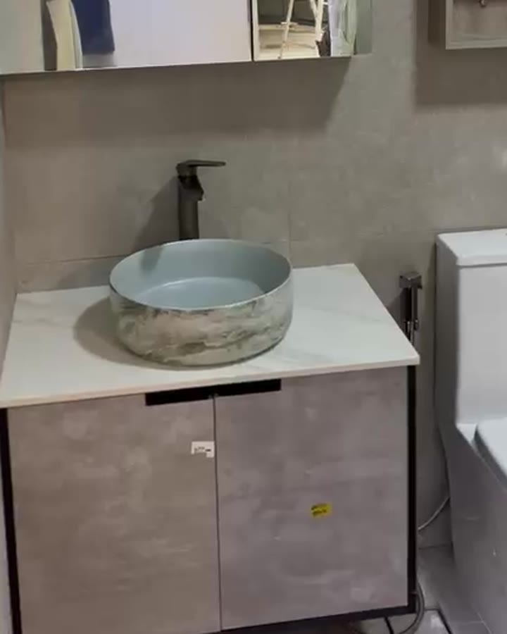 Stone vessel basin and vanity installed by FixMyHouse SG